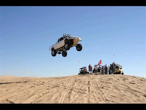 Ford F-150 and Chevy Silverado Prerunners Jumping - YouTube