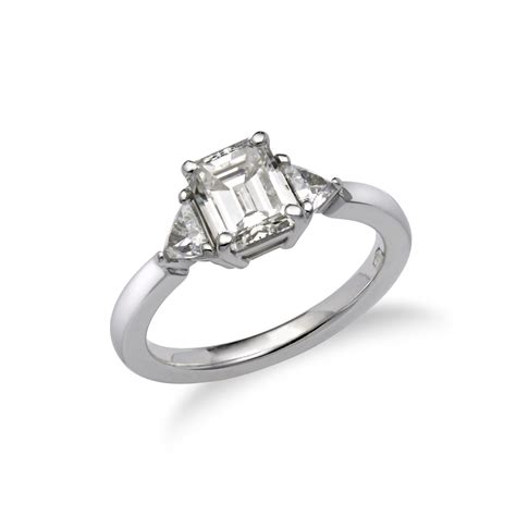 Three-stone emerald-cut diamond engagement ring - Orogem Jewelers