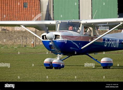 Rheims Cessna 152 Aerobat G-PHUN starting take-ff run Stock Photo - Alamy