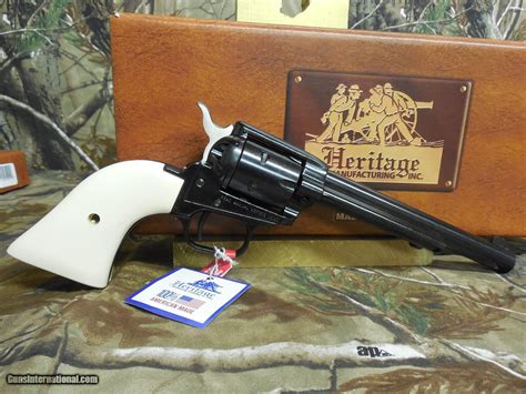 HERITAGE ROUGH RIDER RR22B6 22 L.R. REVOLVER, 6 SHOT, WHITE GRIPS, 6.5" BARREL, FACTORY NEW IN BOX