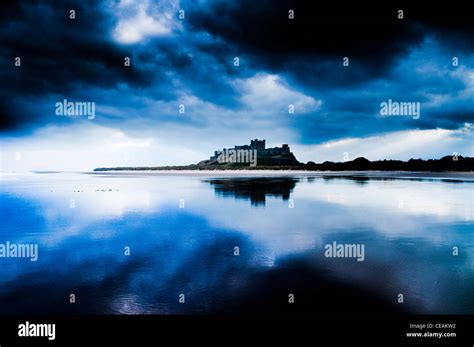 Bamburgh Castle from the beach Stock Photo - Alamy