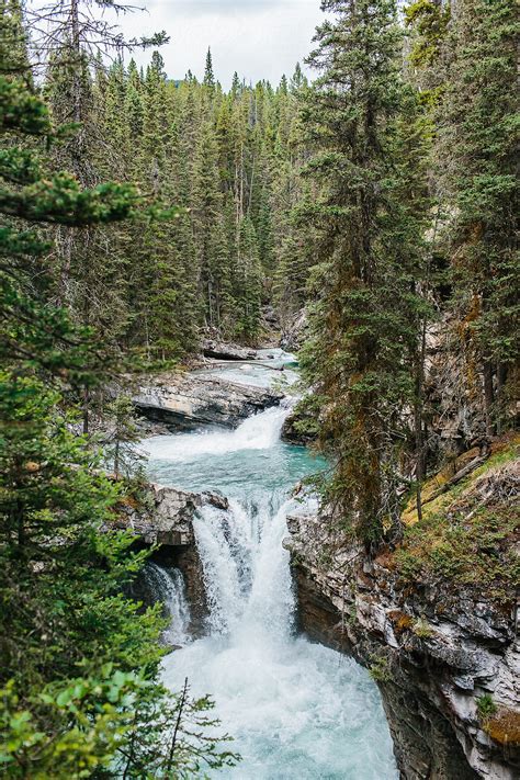 "A Waterfall In Canada" by Stocksy Contributor "Kristen Curette ...