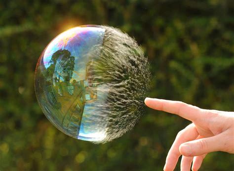 Interesting Photo of the Day: Popping a Bubble