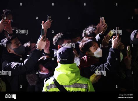 Supporters take photographs of South Korea's President-elect Yoon Suk ...