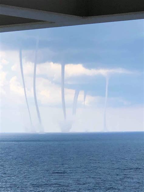 Jamison Lee of Andalusia, AL captures multiple waterspouts on a oil platform near the Gulf of ...