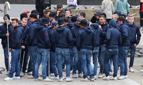 Basel fans arrive for Manchester United Champions League clash… all dressed in identical ...