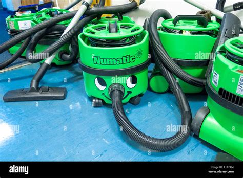 group of Henry Numatic vacuum cleaners in office corridor Stock Photo ...