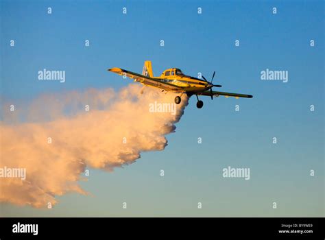 Air Tractor AT-802 firefighting water bomber plane dropping water Stock ...