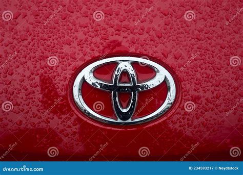 Rain Drops on Toyota Logo on Red Car Front Editorial Photography - Image of brand, company ...