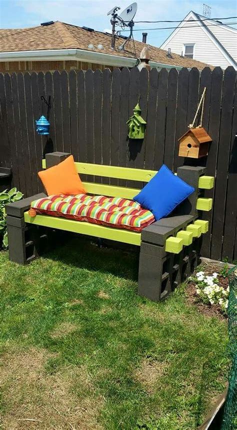 Garden bench made of cinder blocks and pressure treated 4x4. Took about ...