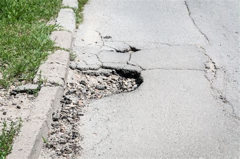 Who Is Responsible for Crumbling, Cracked Sidewalks and Walkways? - Martin & Helms, P.C.