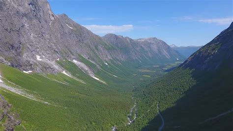 A mountain road with rocks around a bend image - Free stock photo - Public Domain photo - CC0 Images