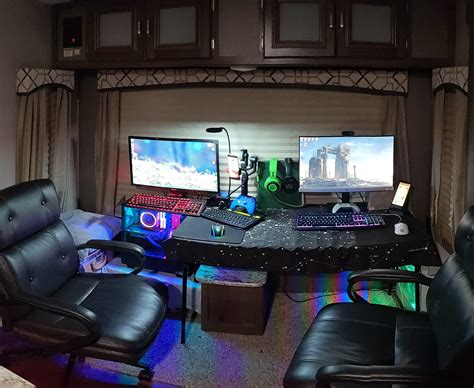 Temporary setup with 2 gaming rigs until we build tables that fit perfectly : r/RVLiving