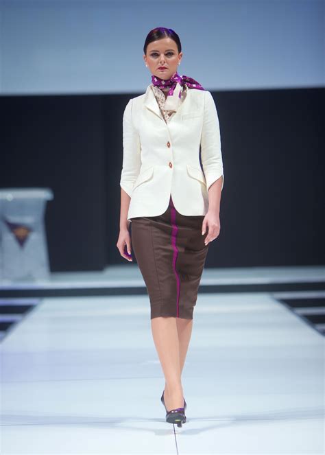 Our beautiful crew modelling the new Etihad uniform on the runway. www.etihad.com | High fashion ...