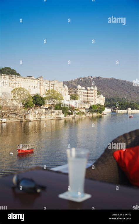 View of City Palace from rooftop restaurant of Lake Pichola Hotel, Udaipur, Rajasthan, India ...