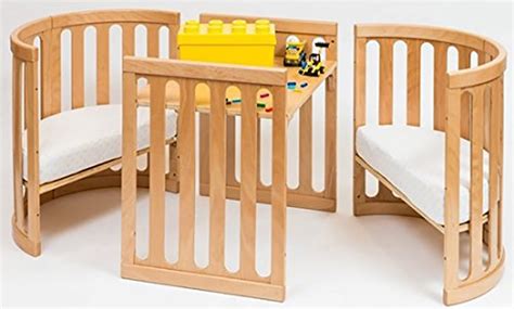 This 4-In-1 Convertible Crib Transforms Into A Toddler Bed And Can Be Used As A Table And Chair Set