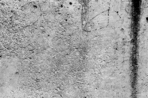 Premium Photo | Concrete wall with cracks and scratches