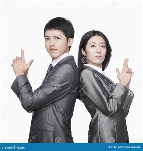 Businessman and Businesswoman Standing Back To Back and Showing Hand ...