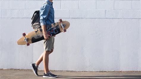 How to Use a Longboard Skateboard Guide for Beginners - The Skateboard ...