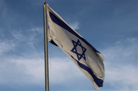 Old Israeli Flag Against Clouds Free Stock Photo - Public Domain Pictures