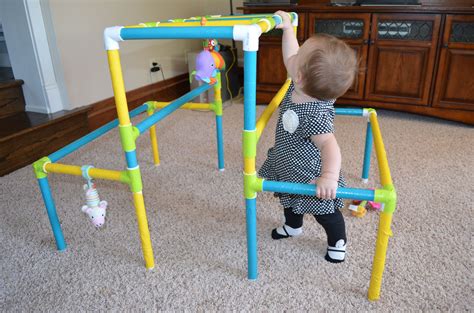 Our granddaughter playing on her jungle gym at 8 months old. | Diy baby gym, Diy baby stuff ...