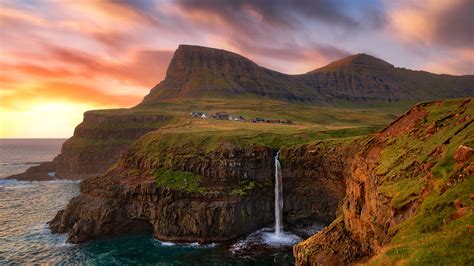 Gásadalur village and waterfall falling into the ocean in Faroe Islands, Denmark | Windows ...