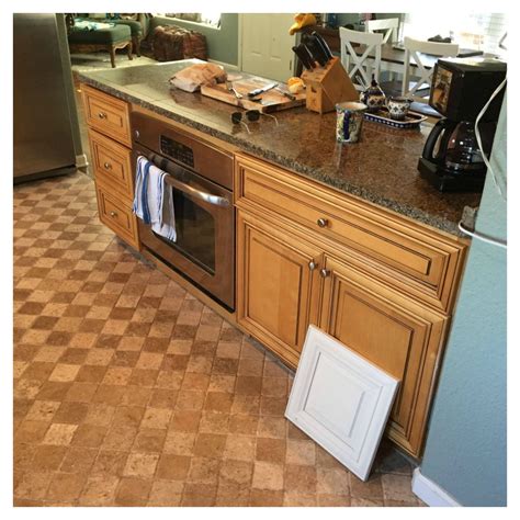 Kitchen Cabinet Resurfacing For Less Than $200 Will Knock Your Socks Off