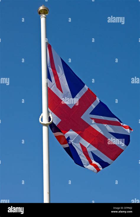 Union Jack flag on flagpole Stock Photo - Alamy