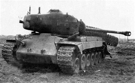 Kocked out M26 Pershing tank north of Cologne, Germany. It was hit by a ...