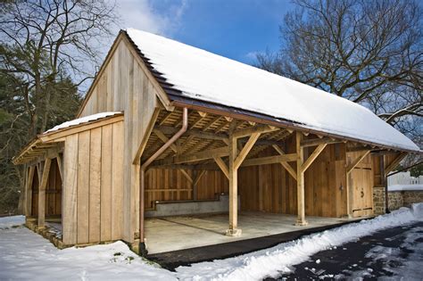 Timber framed carriage shed with firewood storage. | Timber framing, Barns sheds, Shed plans