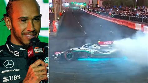 Lewis Hamilton almost CRASHES as doughnuts stunt spirals out of control ...