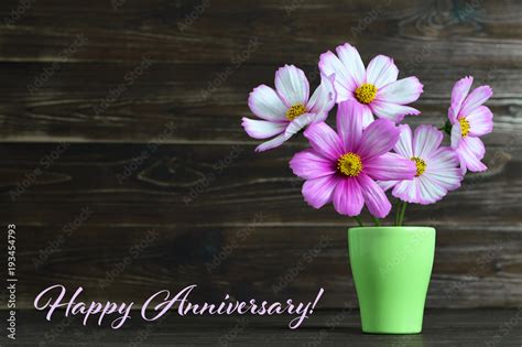 Happy Anniversary card with flowers in the vase Stock Photo | Adobe Stock