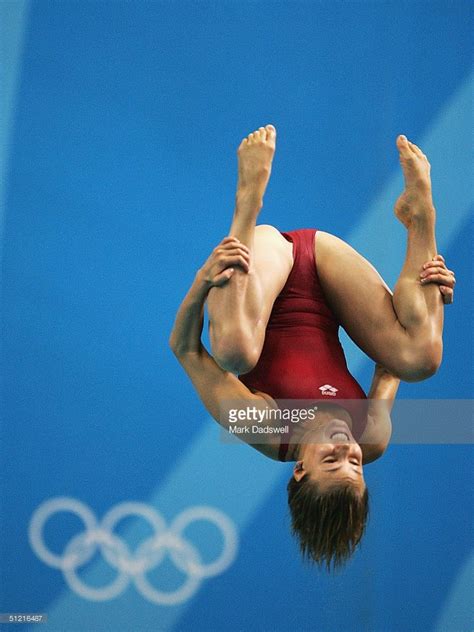 Tania Cagnotto of Italy competes in the women's diving 3 metre springboard preliminary event on ...