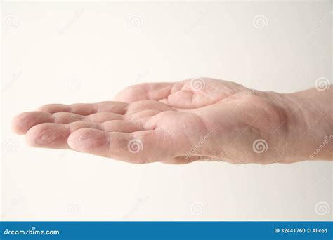 Man Holds His Hand Palm Up Stock Photo - Image: 32441760