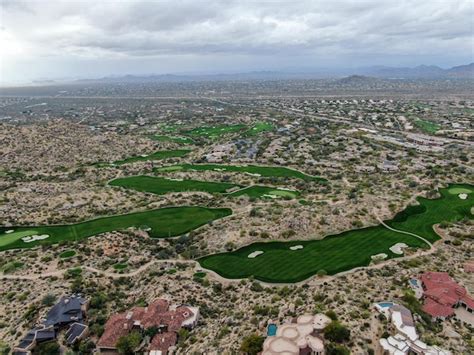 Premium Photo | Aerial view above golf course and upscale luxury homes in scottsdale phoenix arizona