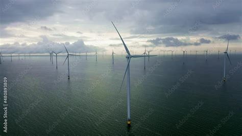 Drone video of the offshore wind turbine at Fryslan wind farm in the ...