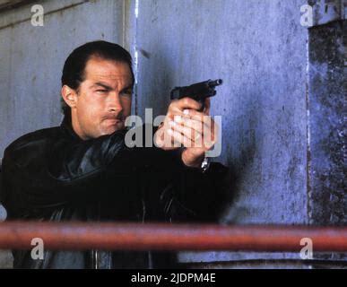 ABOVE THE LAW, Steven Seagal, 1988. © Warner Bros. / Courtesy Everett Collection Stock Photo - Alamy