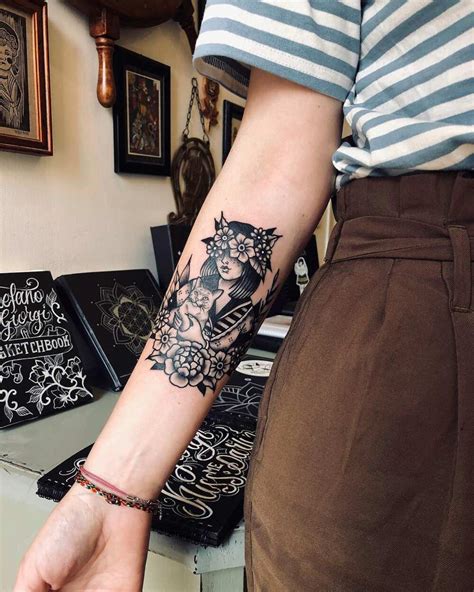 50 cool arm tattoos design ideas for men and women - Legit.ng