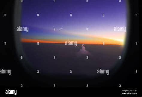 Sunset view from the airplane window Stock Photo - Alamy