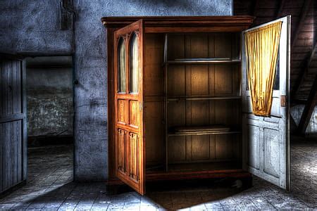 Royalty-Free photo: Photograph of opened cabinet between doorway | PickPik