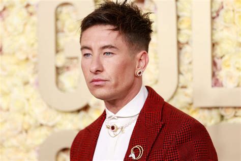 Barry Keoghan Attends Golden Globes 2024 in Red Suit, Pearls