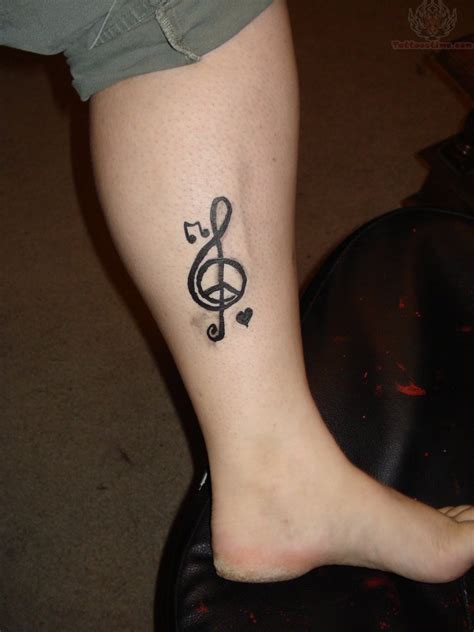 Tiny Heart And Peace Sign Tattoo On Leg