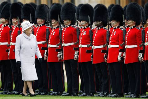 The distinctive bearskin hats worn by the Queen’s Guard are under threat | Tatler