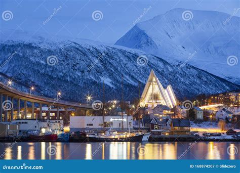 View On Tromso Bridge And Arctic Cathedral At Polar Night, Tromso, Norway Stock Photo ...