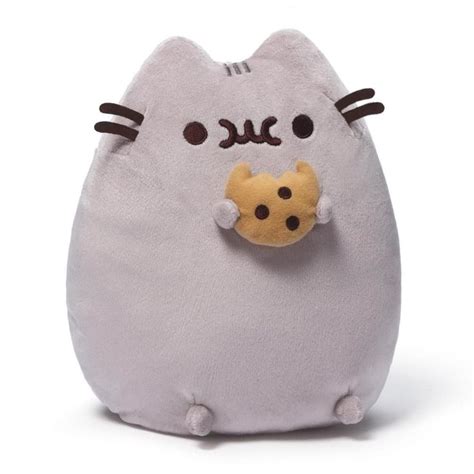 Pusheen satisfies her craving for sweet and yummy things while holding onto this tasty looking ...