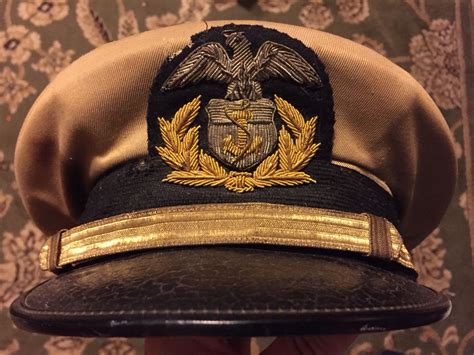 Another World War II era merchant marine officer hat, this with a lovely bullion badge. (With ...