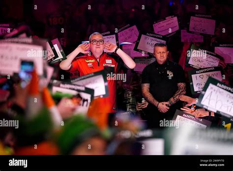 Stephen Bunting walks out to play Michael van Gerwen (not pictured) on day twelve of the Paddy ...