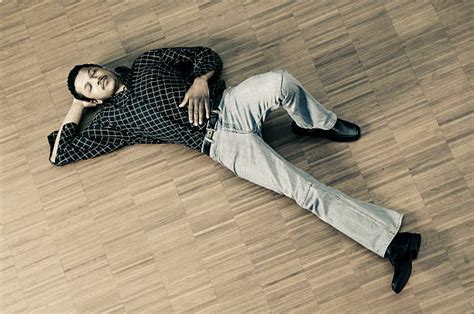 Man Sleeping On Floor Stock Photos, Pictures & Royalty-Free Images - iStock