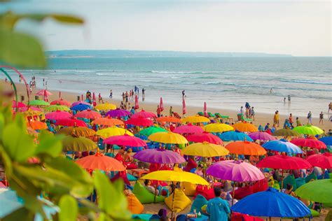 Colorful umbrellas at La Plancha beach. | Colorful umbrellas, Pangea, Bali