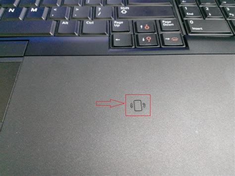 laptop - What does the "rectangle with waves" logo to the right of the trackpad mean on my Dell ...